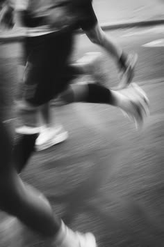 Runners in motion, blurred, black and white